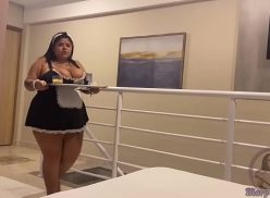 Fat maid giving a blowjob at work