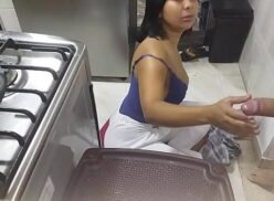 Stepmother giving stepson blowjob in kitchen